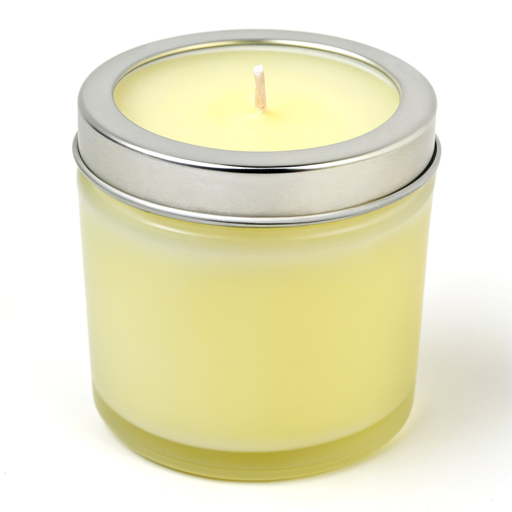 Naldony Citrus Breeze Soy Candle — three-quarter front view in frosted glass jar with metal lid