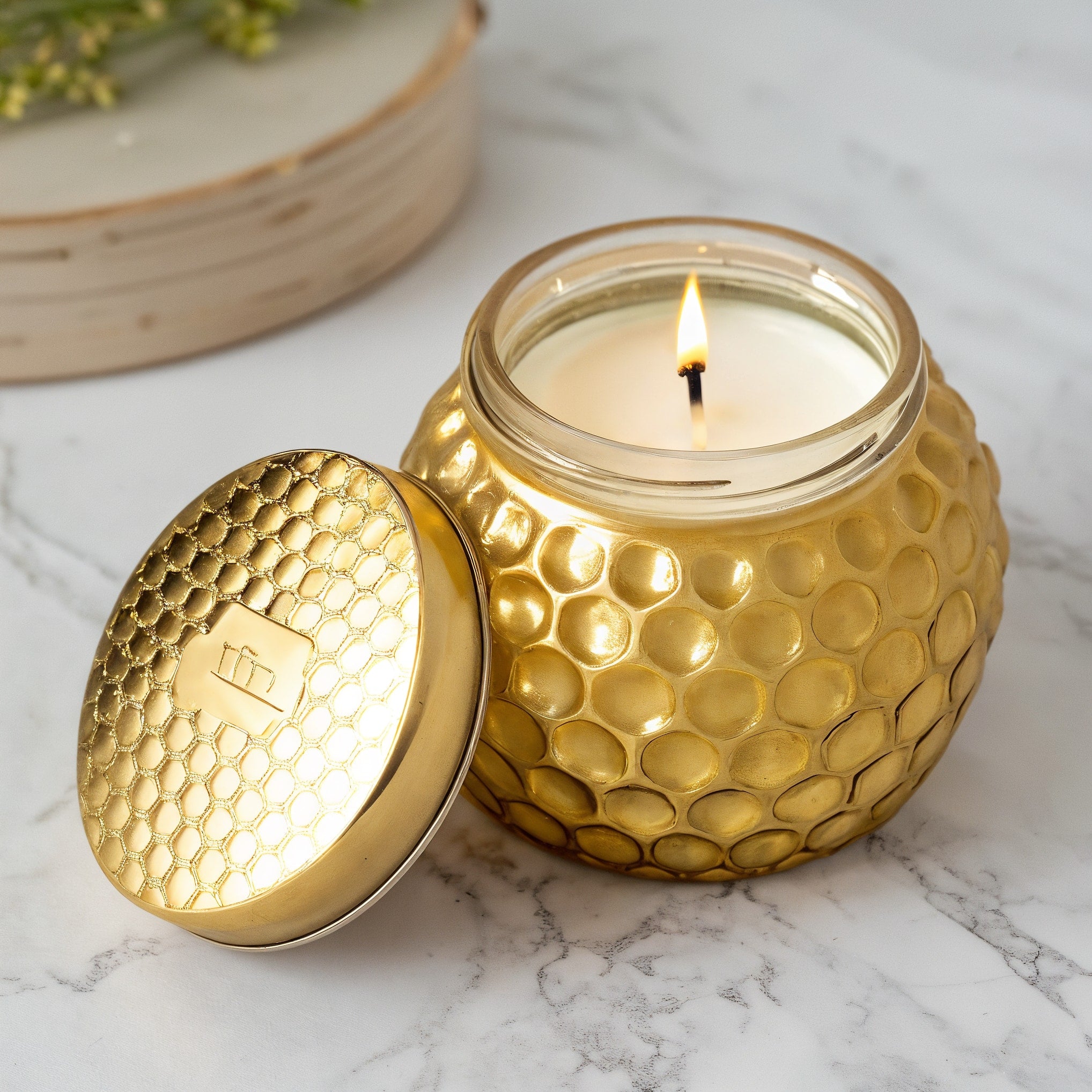 Naldony Honey Nectar Soy Candle — three-quarter front view showing the golden jar with honeycomb texture