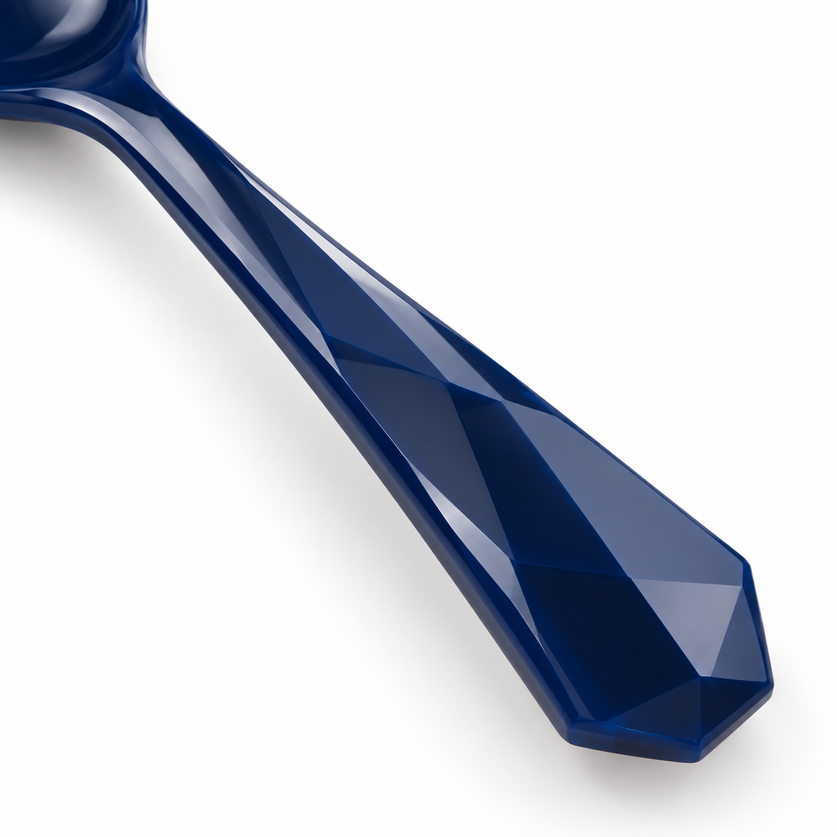 Deep blue plastic spoon with an elegant design.