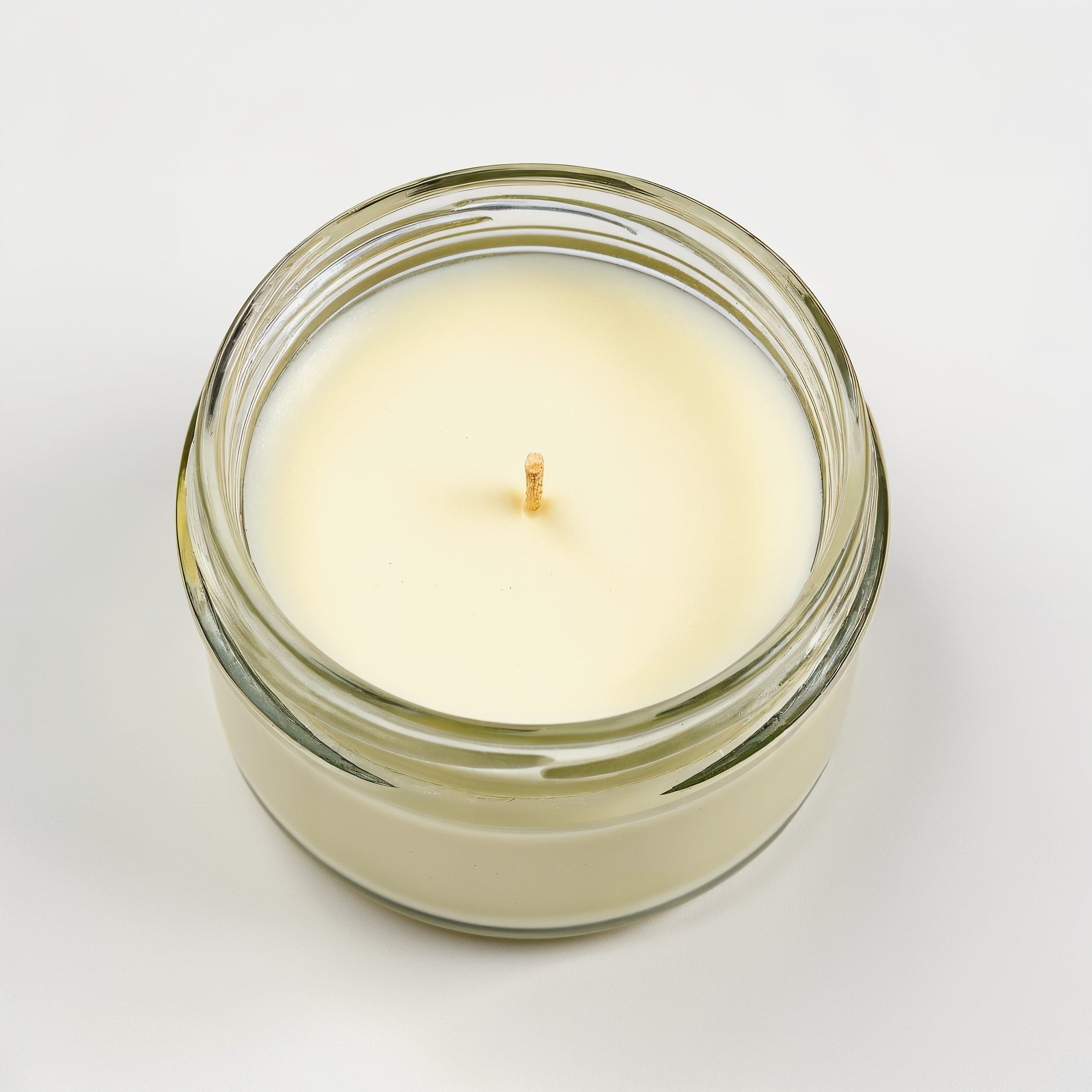 Naldony Lemon Verbena Soy Candle — top-down view showing wax and wick inside jar