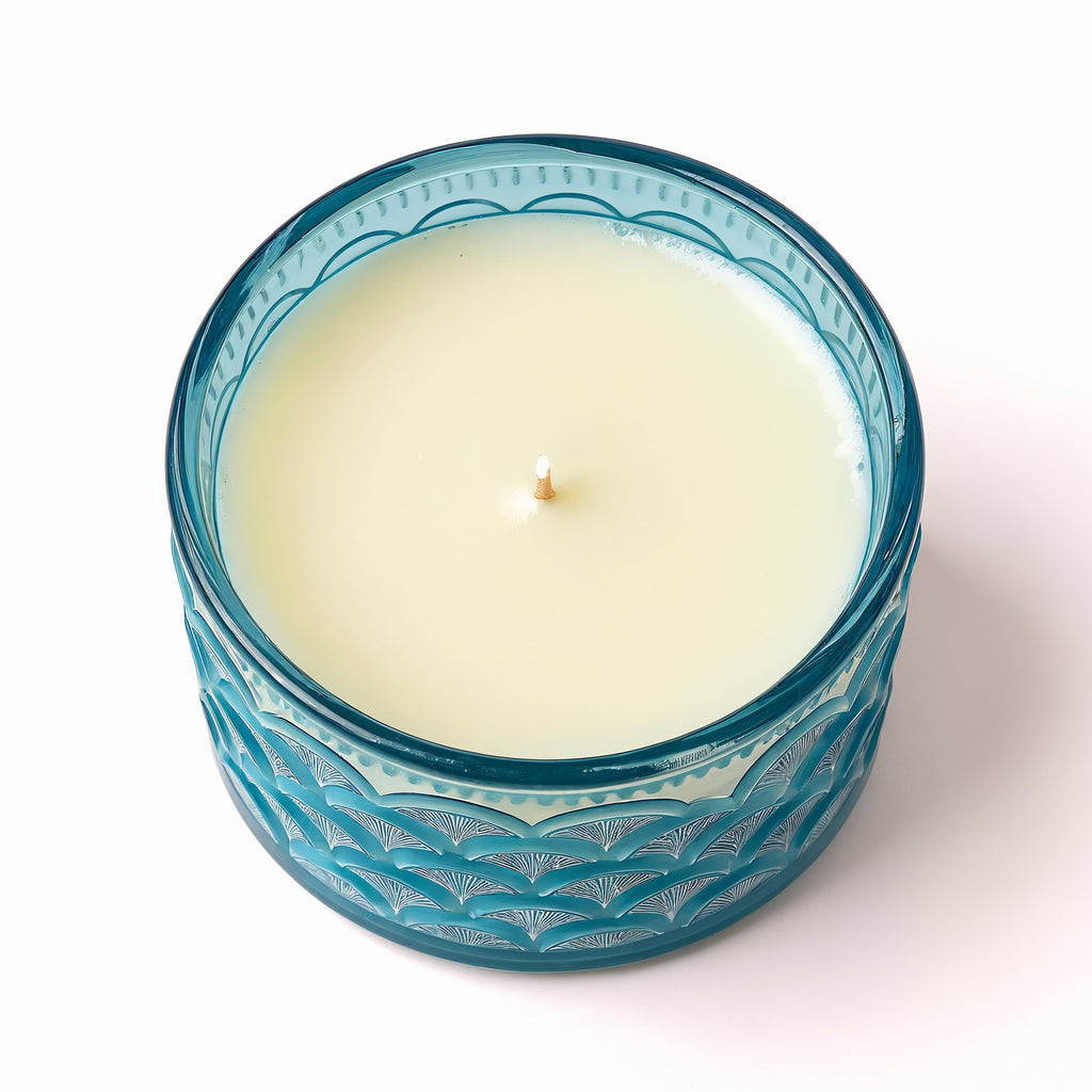 Naldony Ocean Mist Soy Candle — top-down view showing the interior of the blue glass jar