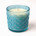 Naldony Ocean Mist Soy Candle — direct side profile showing the wave pattern on blue glass