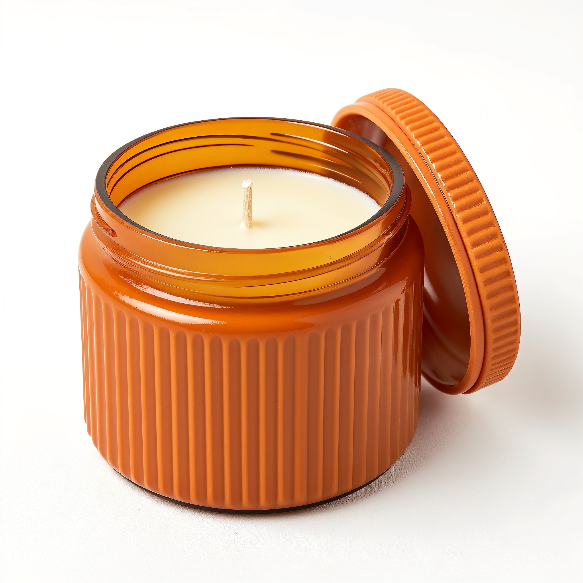 Naldony Ginger Spice Soy Candle — side profile of the orange ribbed jar