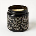 Naldony Black Tea Soy Candle — side profile of black jar with pattern