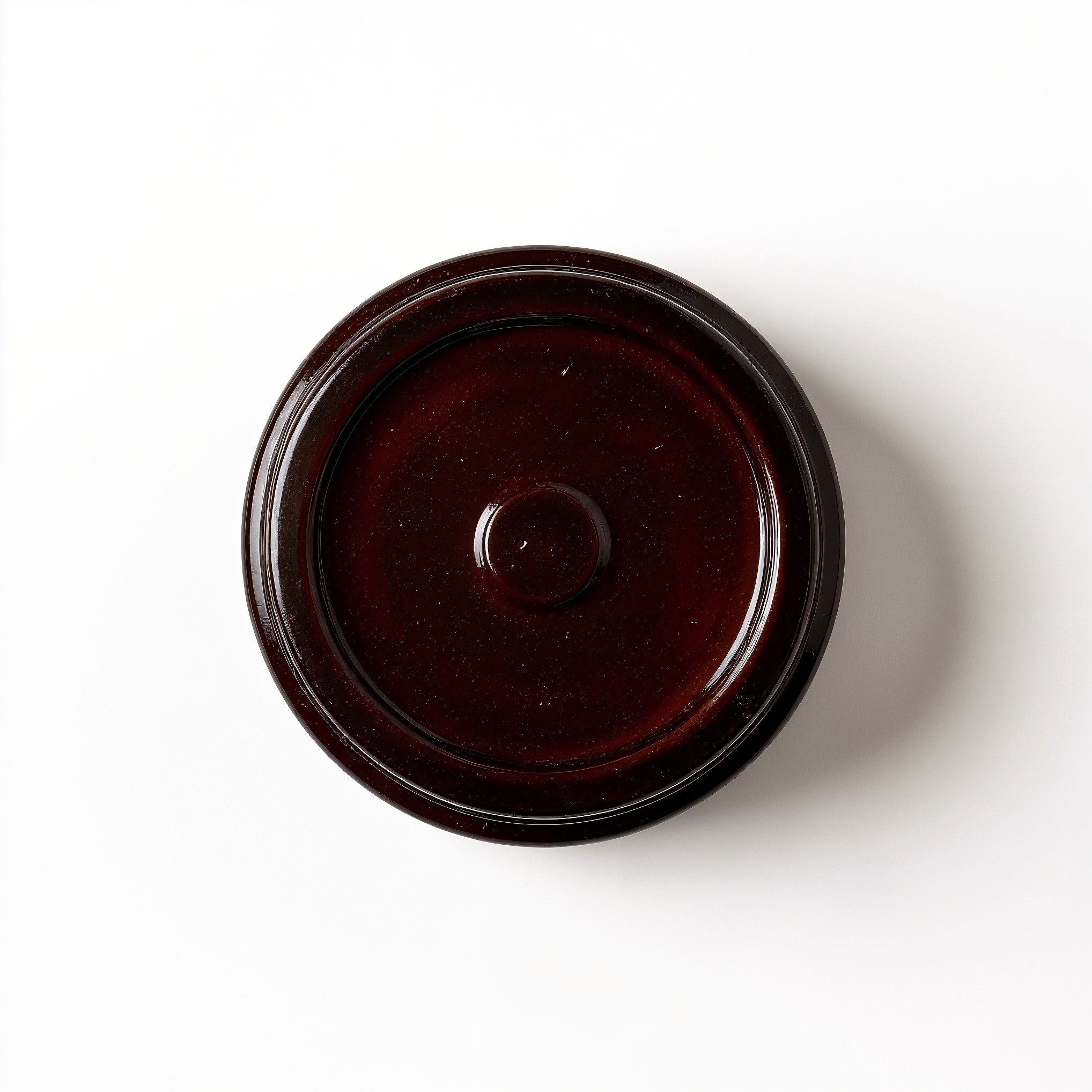 Naldony Cedarwood Musk Soy Candle — base view showing texture
