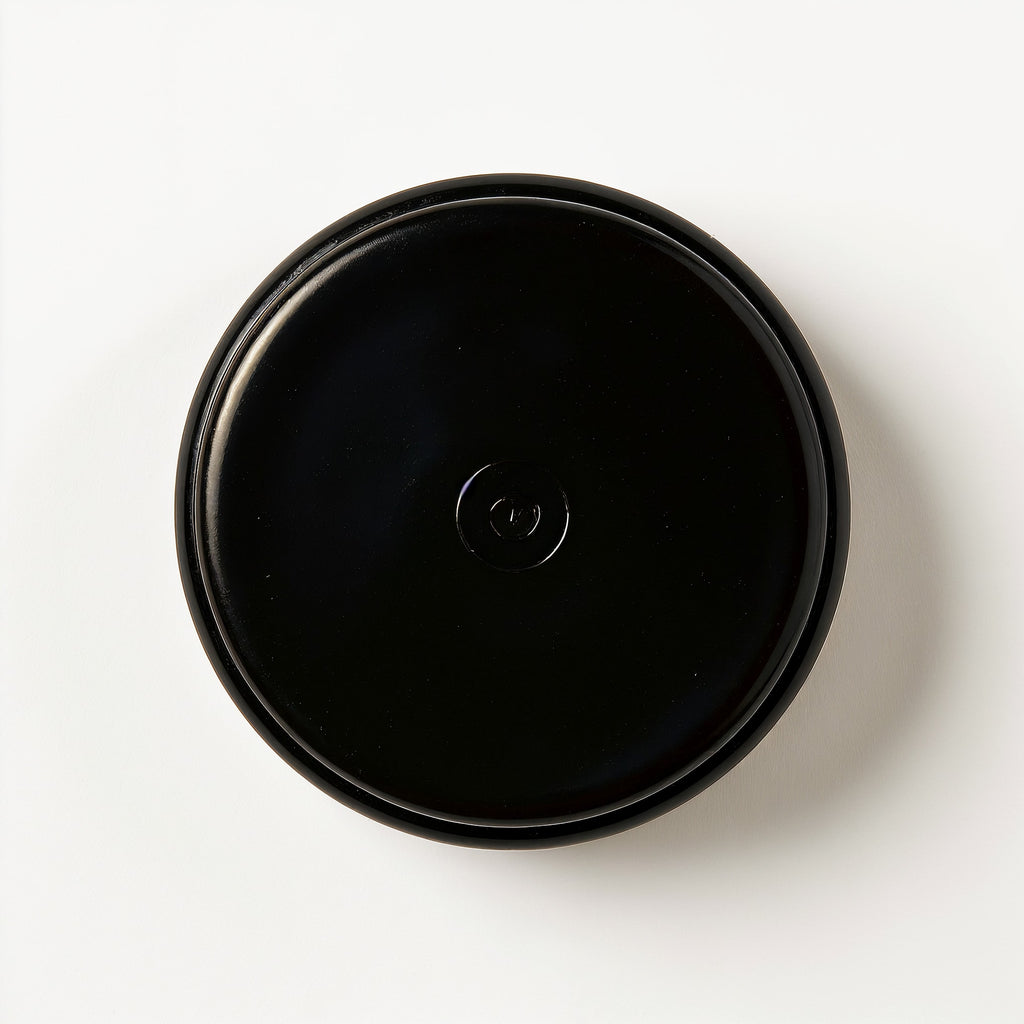 Naldony Black Tea Soy Candle — bottom view showing base of jar
