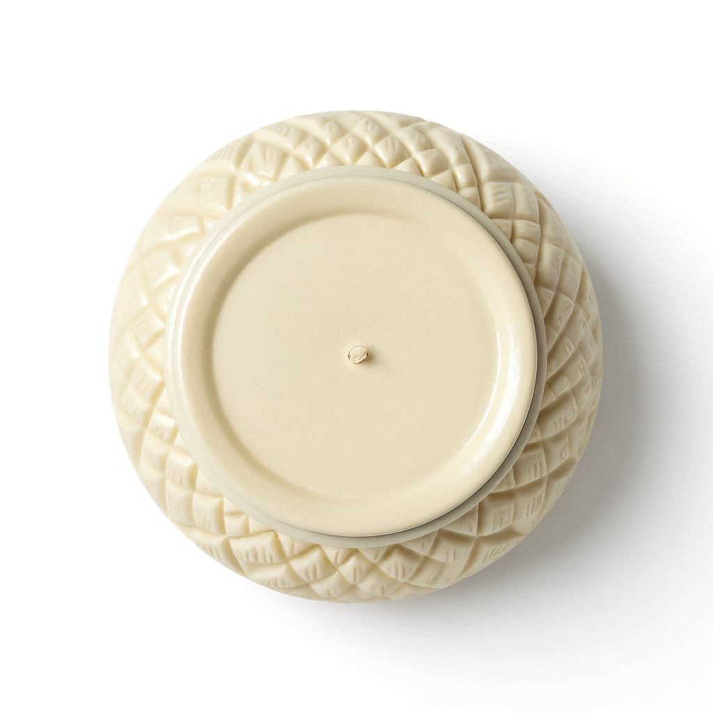 Naldony Vanilla Coconut Soy Candle — Underside view showing bottom of ivory jar