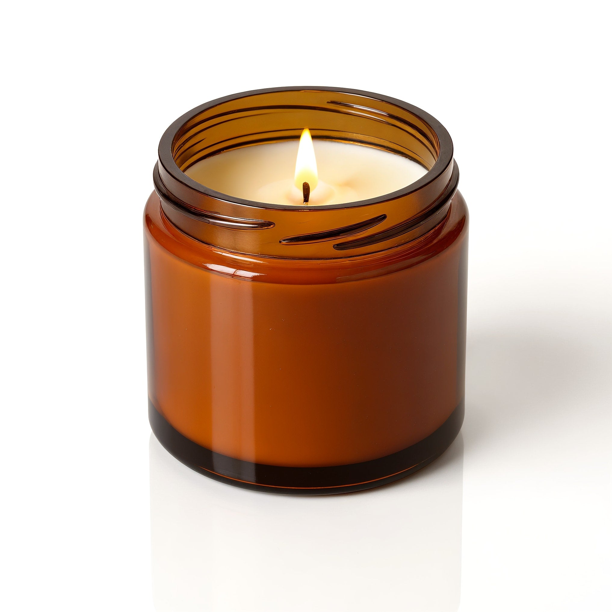 Naldony Amber Nights Soy Candle — Macro detail of the bottom with logo placement