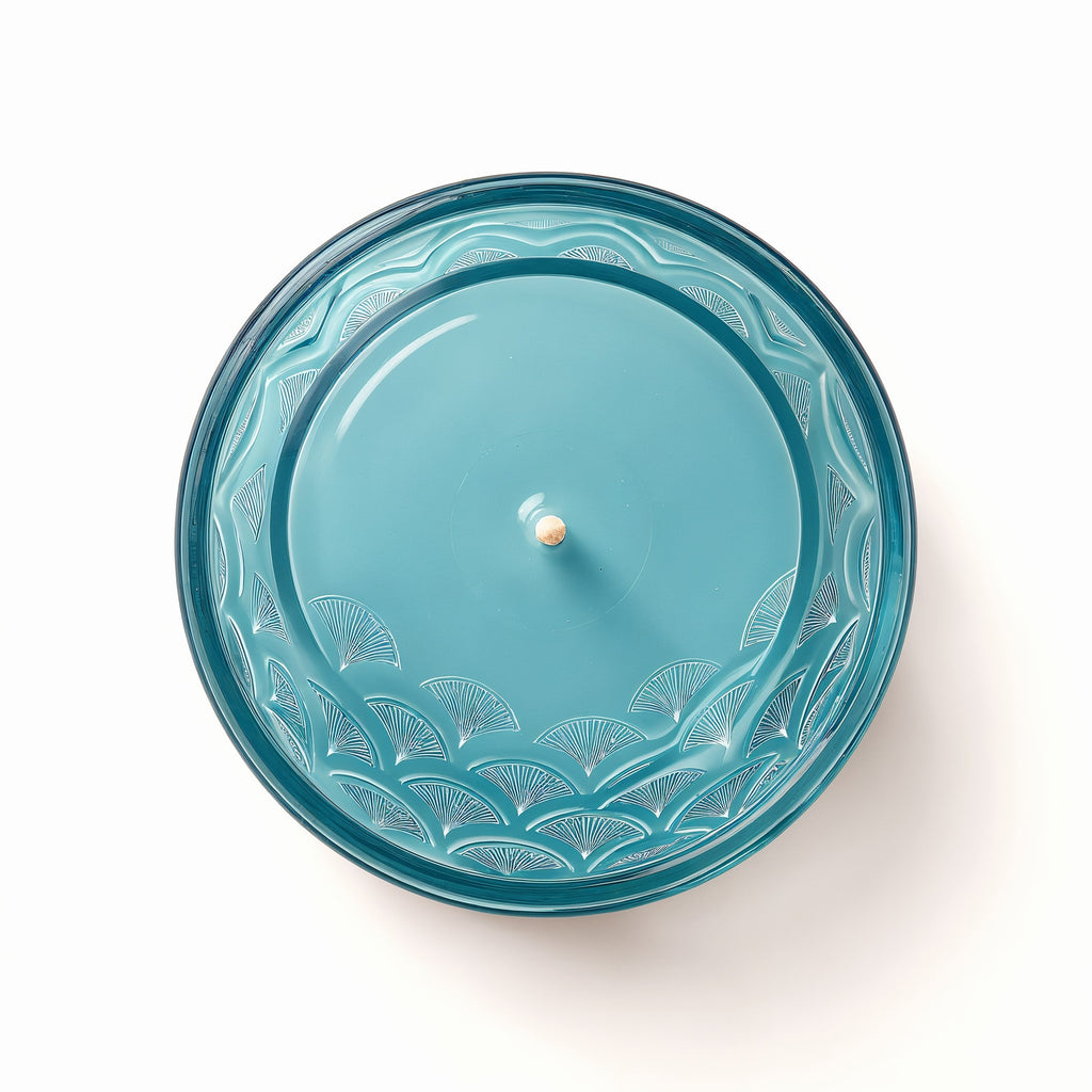 Naldony Ocean Mist Soy Candle — base view of the blue glass jar showing the underside