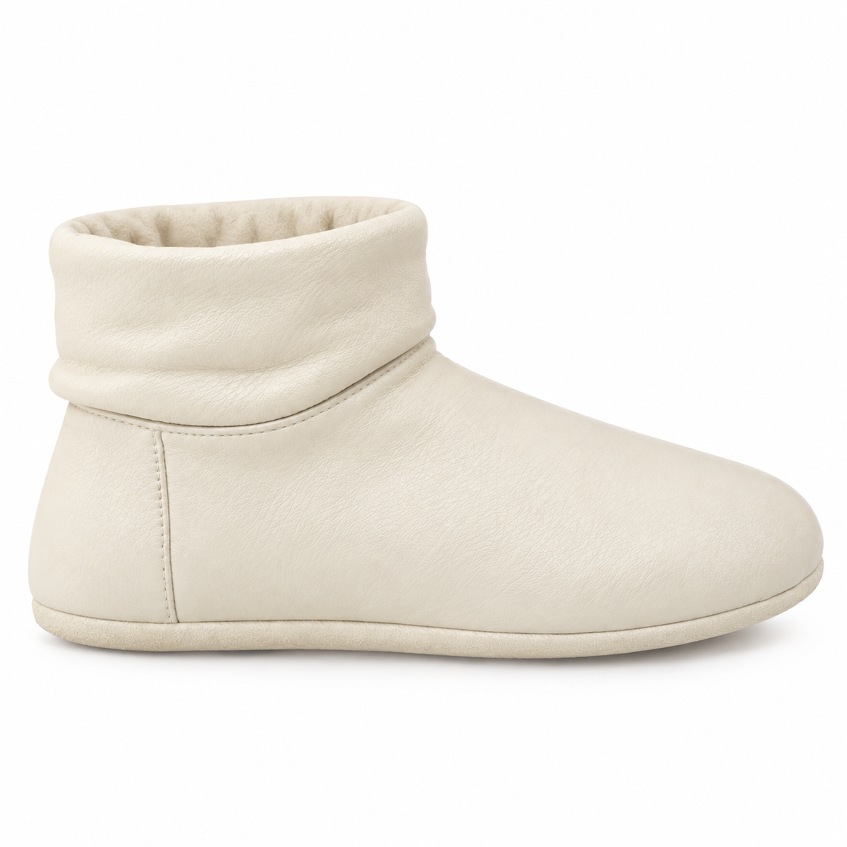 Close-up of fold-over collar on cream boot.