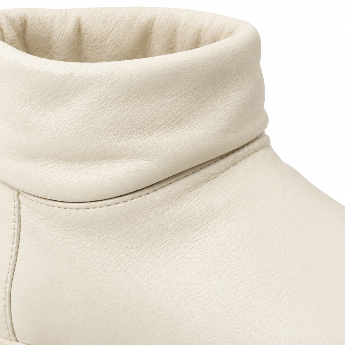 Elegant cream ankle boot for women.