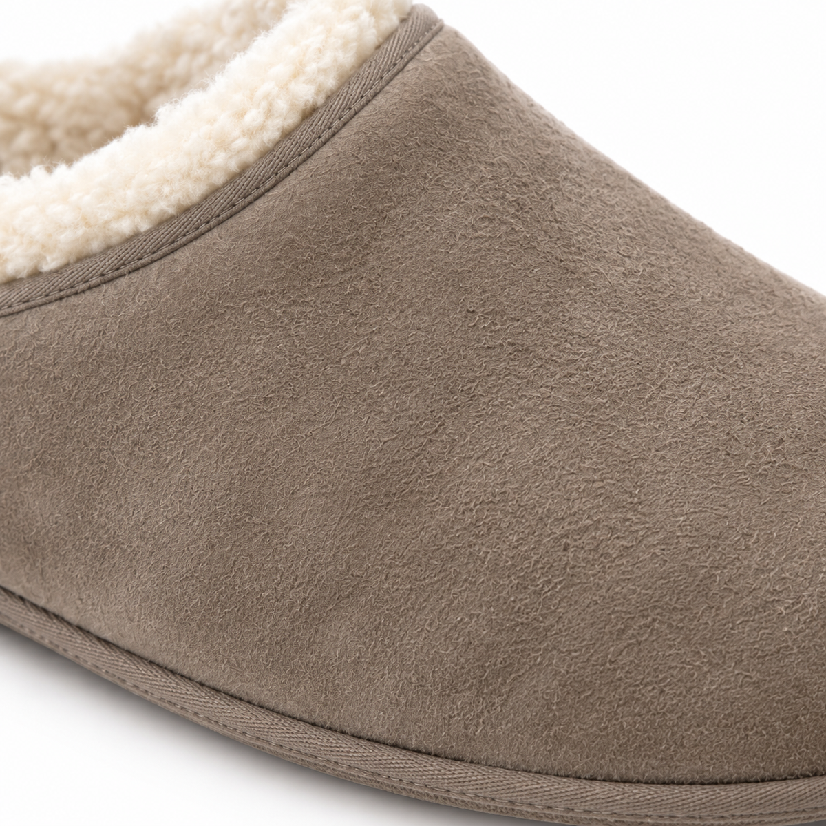 Detail of the slipper's stitching and material.