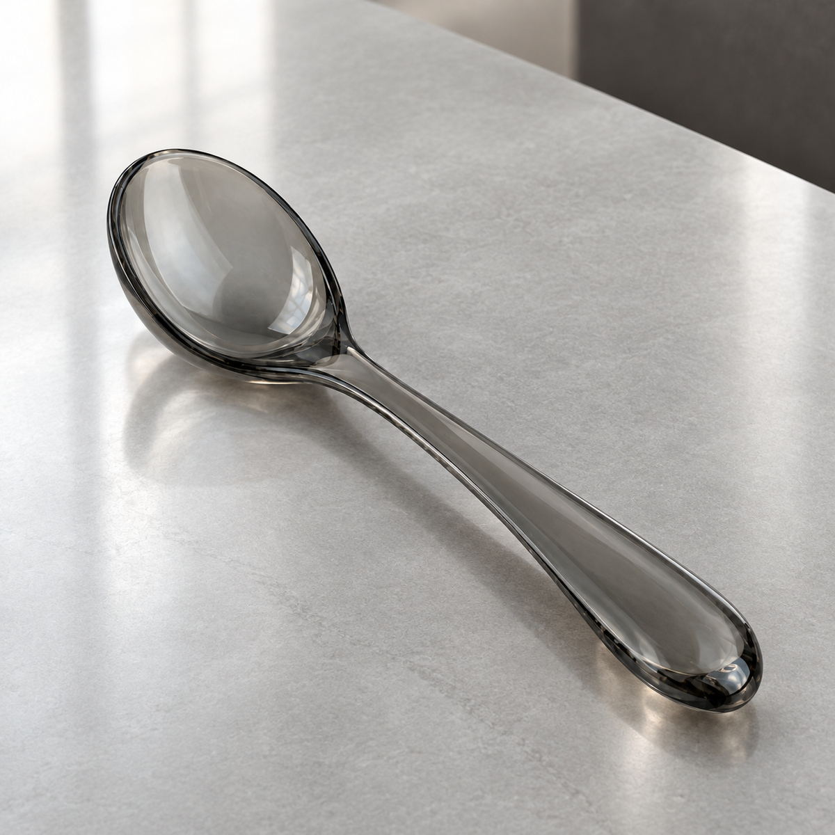 Close-up of sleek black dining spoon