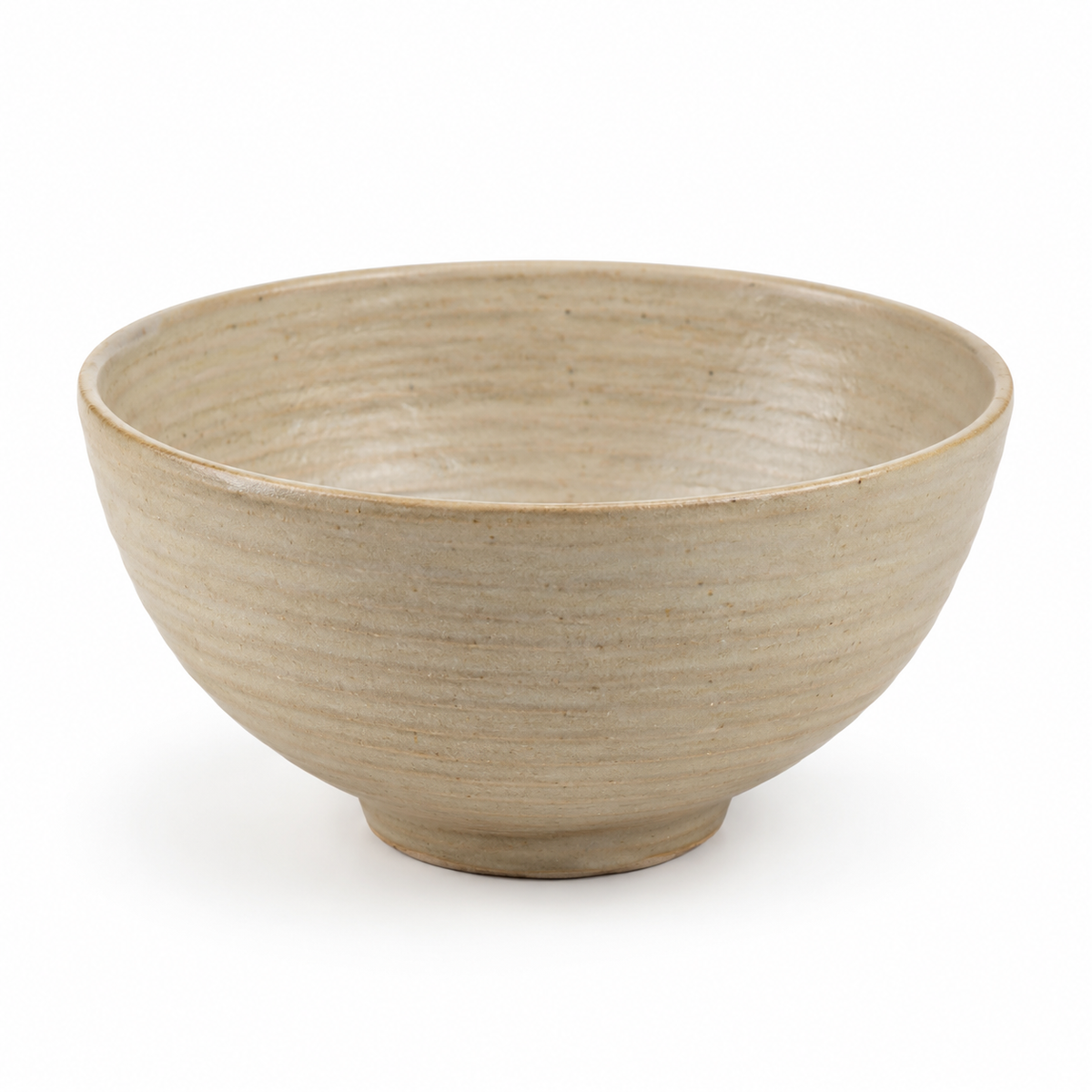 Front view of naldony ceramic serving bowl in beige.
