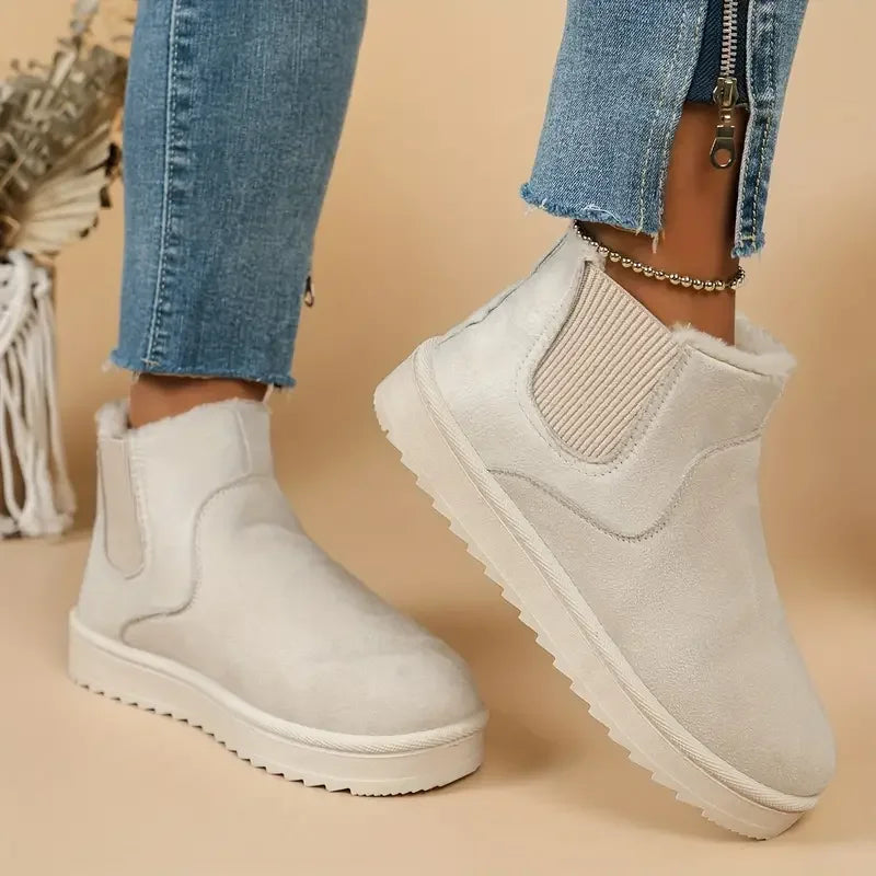 Women's fur lined winter ankle boots with elasticated sides