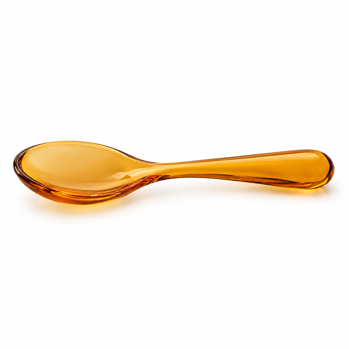 Close-up of amber spoon handle.