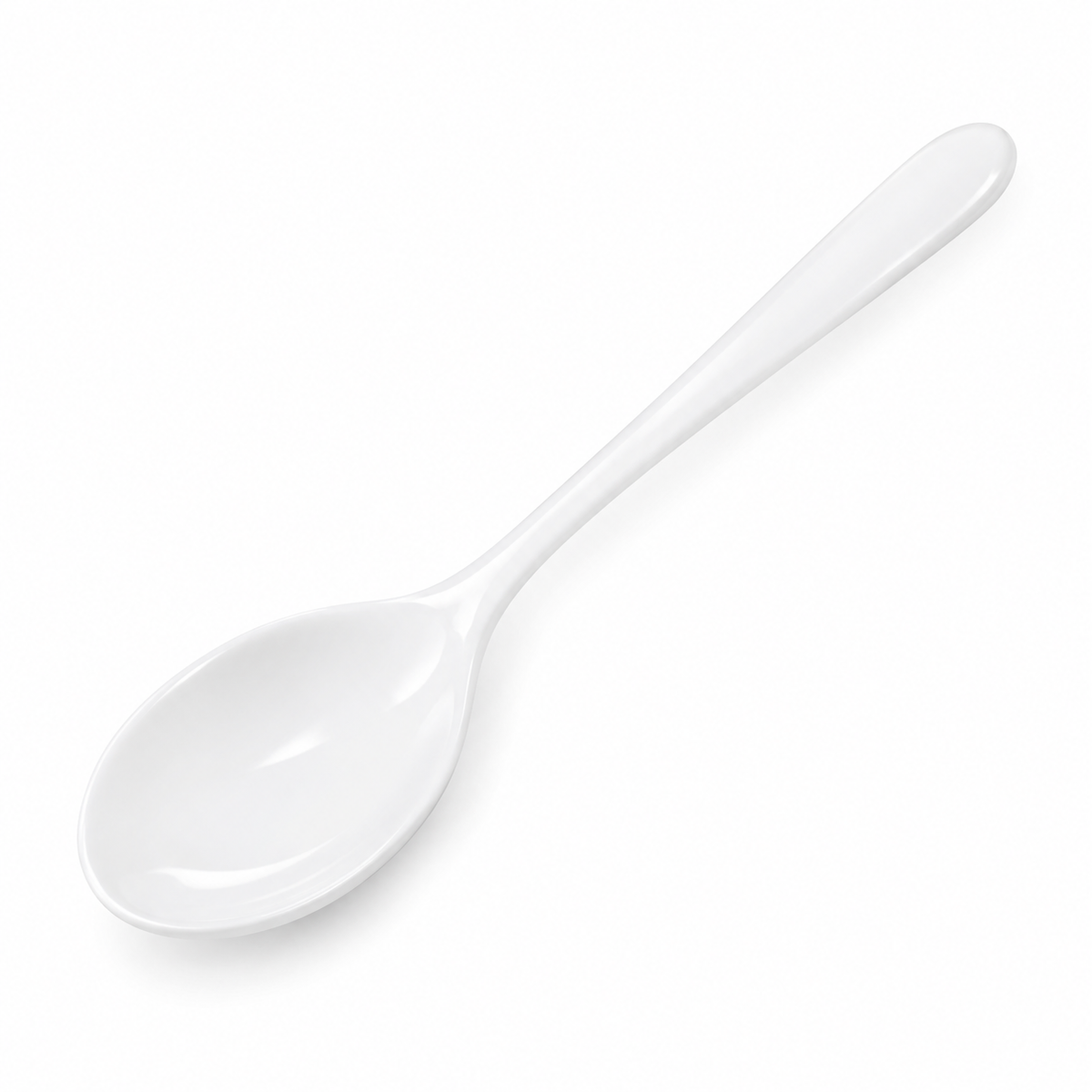 Elegant white porcelain spoon on a white background