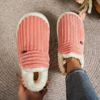 Closed-back winter slippers in ribbed fabric with fleece lining