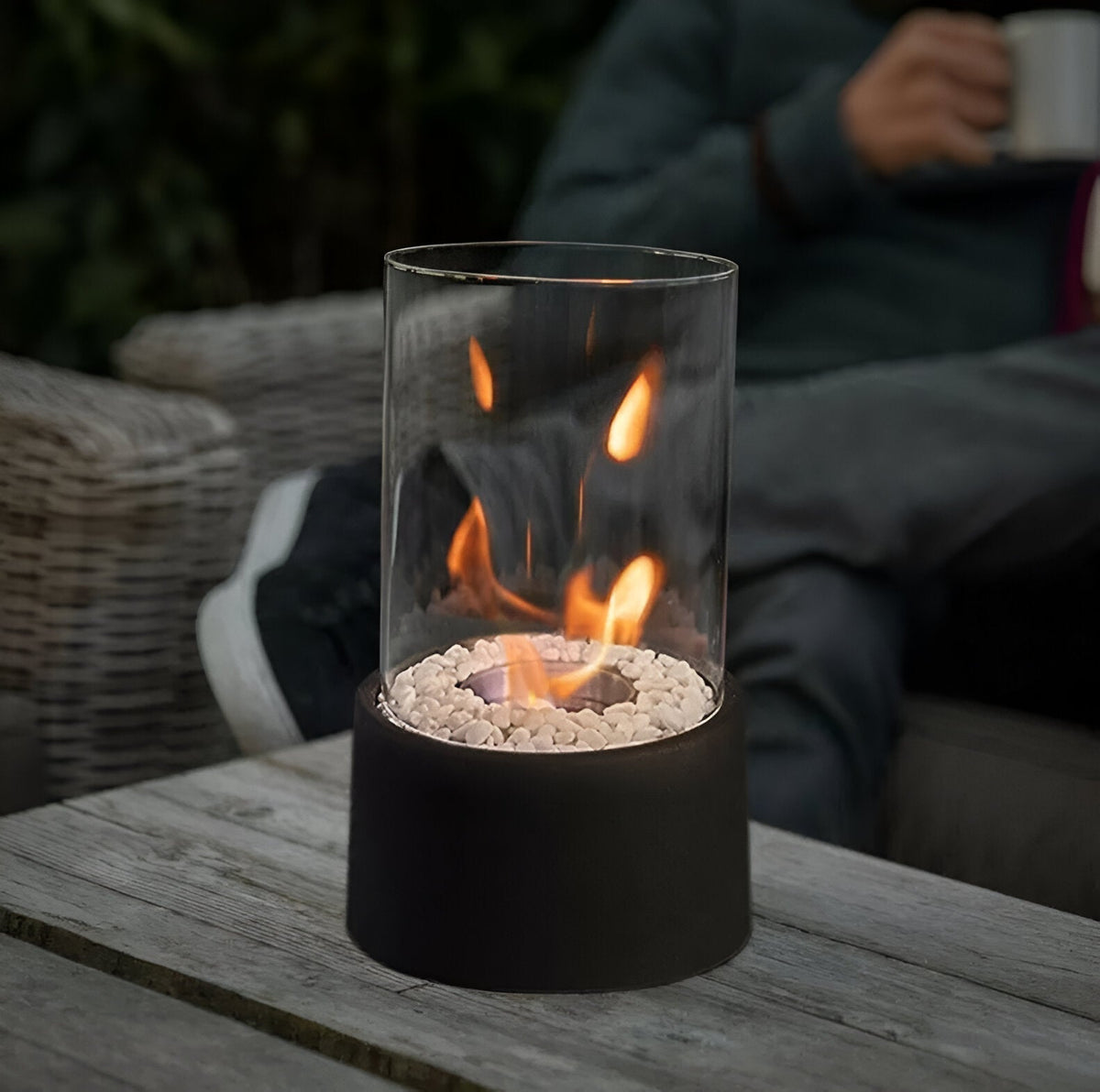 Tabletop bioethanol fireplace with glass cylinder
