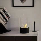 Tabletop bioethanol fireplace with glass cylinder