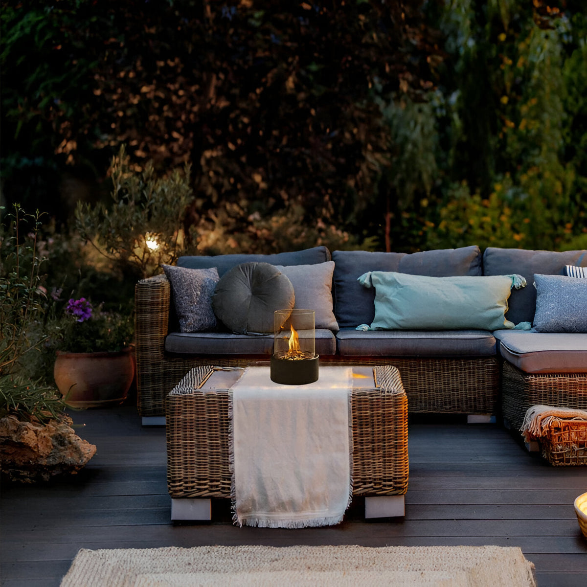 Tabletop bioethanol fireplace with glass cylinder