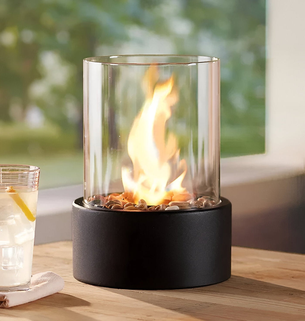 Tabletop bioethanol fireplace with glass cylinder