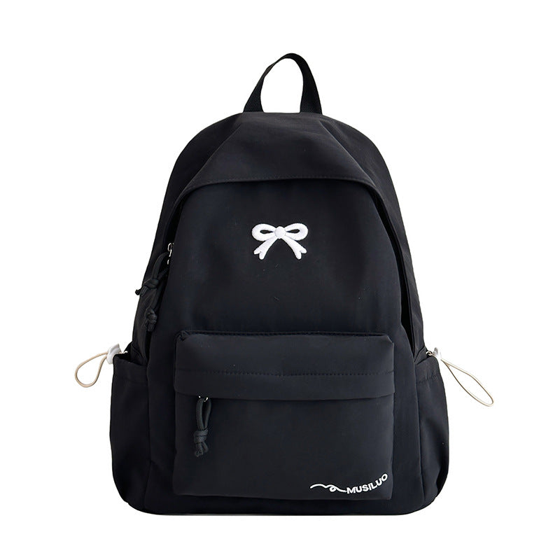 Bow-embossed casual school backpack, water-resistant, padded straps