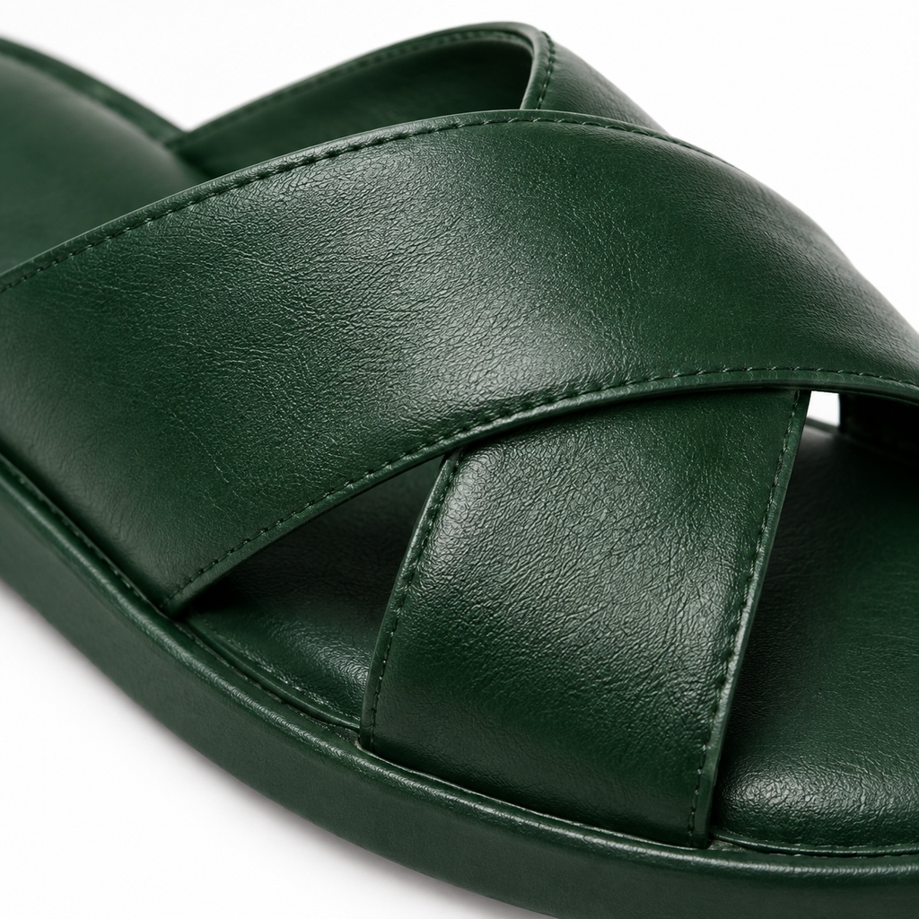 Detail of faux leather texture on Naldony green sandal.