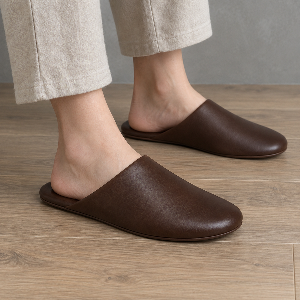 Elegant brown slipper with cushioned insole.