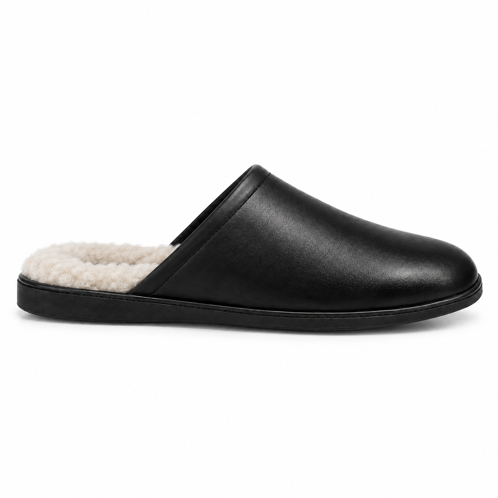 Naldony slipper showcasing black leather exterior and white faux fur.
