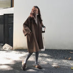 Women's oversized coat with patch pockets