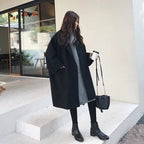 Women's oversized coat with patch pockets