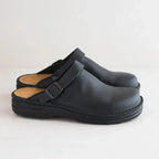 Closed toe leather-look clogs with buckle strap