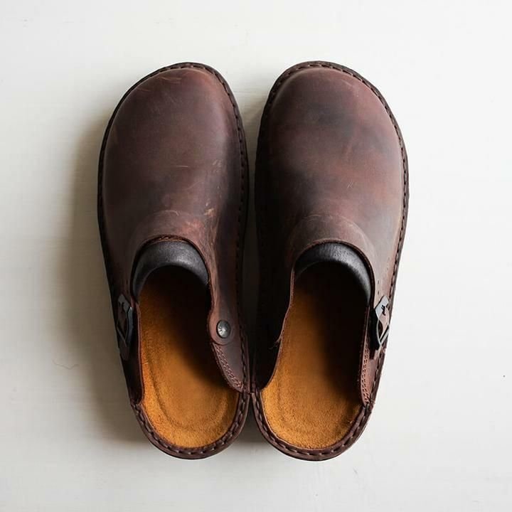 Closed toe leather-look clogs with buckle strap