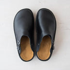 Closed toe leather-look clogs with buckle strap