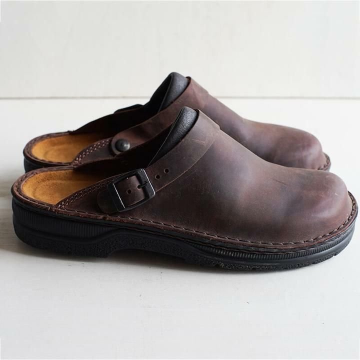Closed toe leather-look clogs with buckle strap