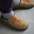 Closed toe leather-look clogs with buckle strap