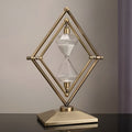 Hourglass with geometric metal frame – Meditation timer with white sand
