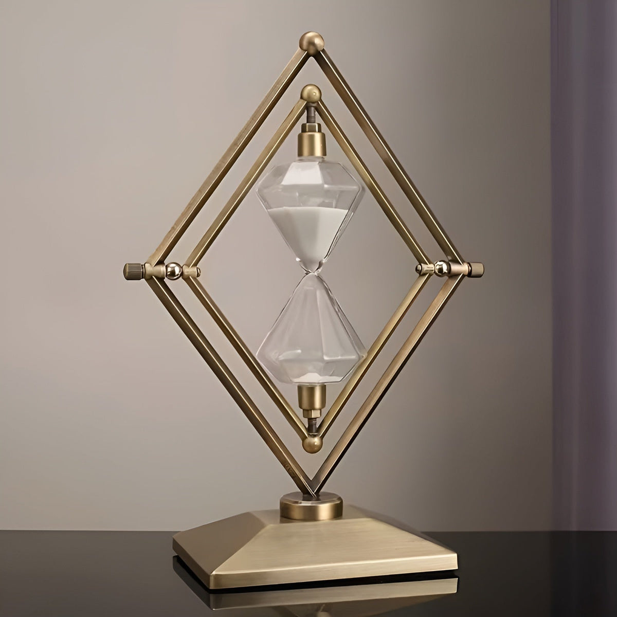 Hourglass with geometric metal frame – Meditation timer with white sand