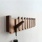 Wall-mounted wooden piano coat rack with flip-down hooks
