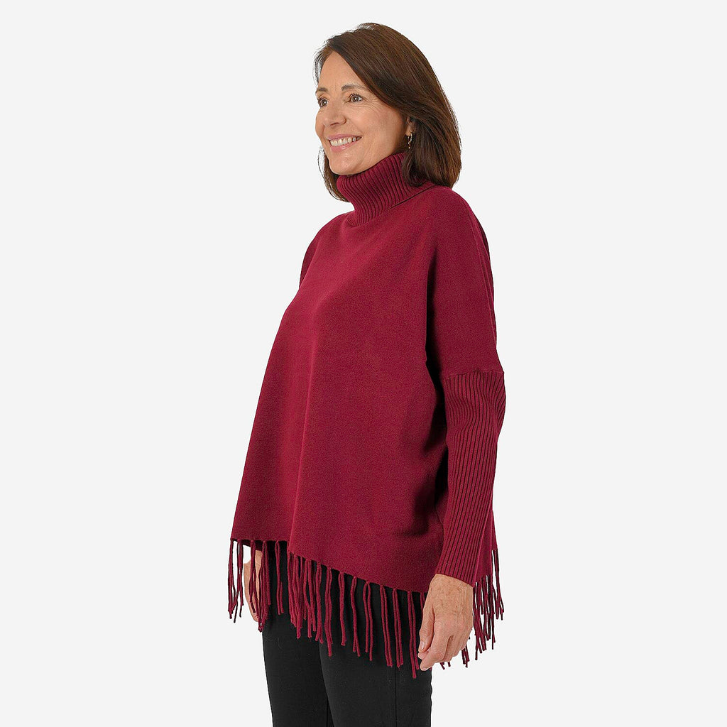 Mudflower Women's Roll Neck Fringe Hem Jumper with Relaxed Poncho Fit