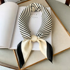 Silk checkered scarf with charm