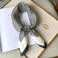 Silk checkered scarf with charm