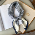 Silk checkered scarf with charm