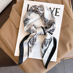 Silk checkered scarf with charm