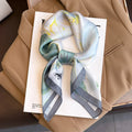 Silk checkered scarf with charm