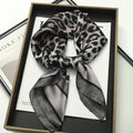 Silk checkered scarf with charm