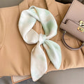 Silk checkered scarf with charm