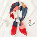 Silk checkered scarf with charm