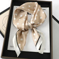 Silk checkered scarf with charm